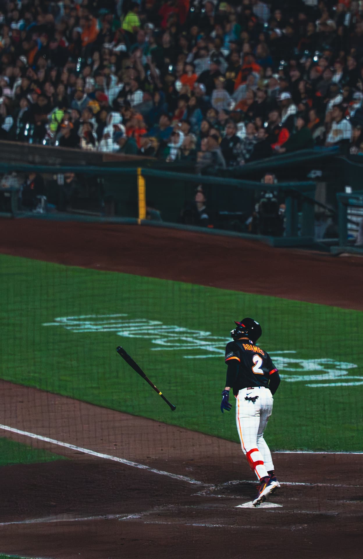 Bat flip after a home run swing