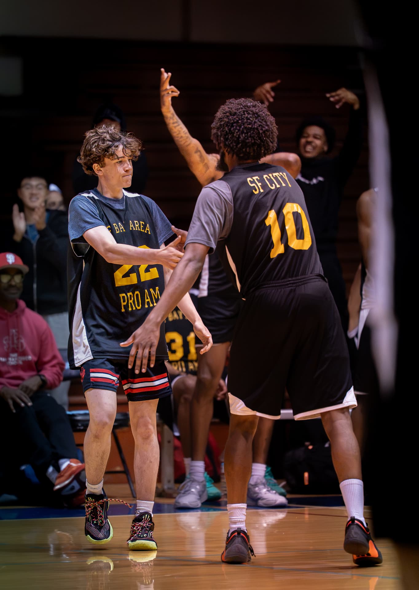 Teammates celebrating a made shot