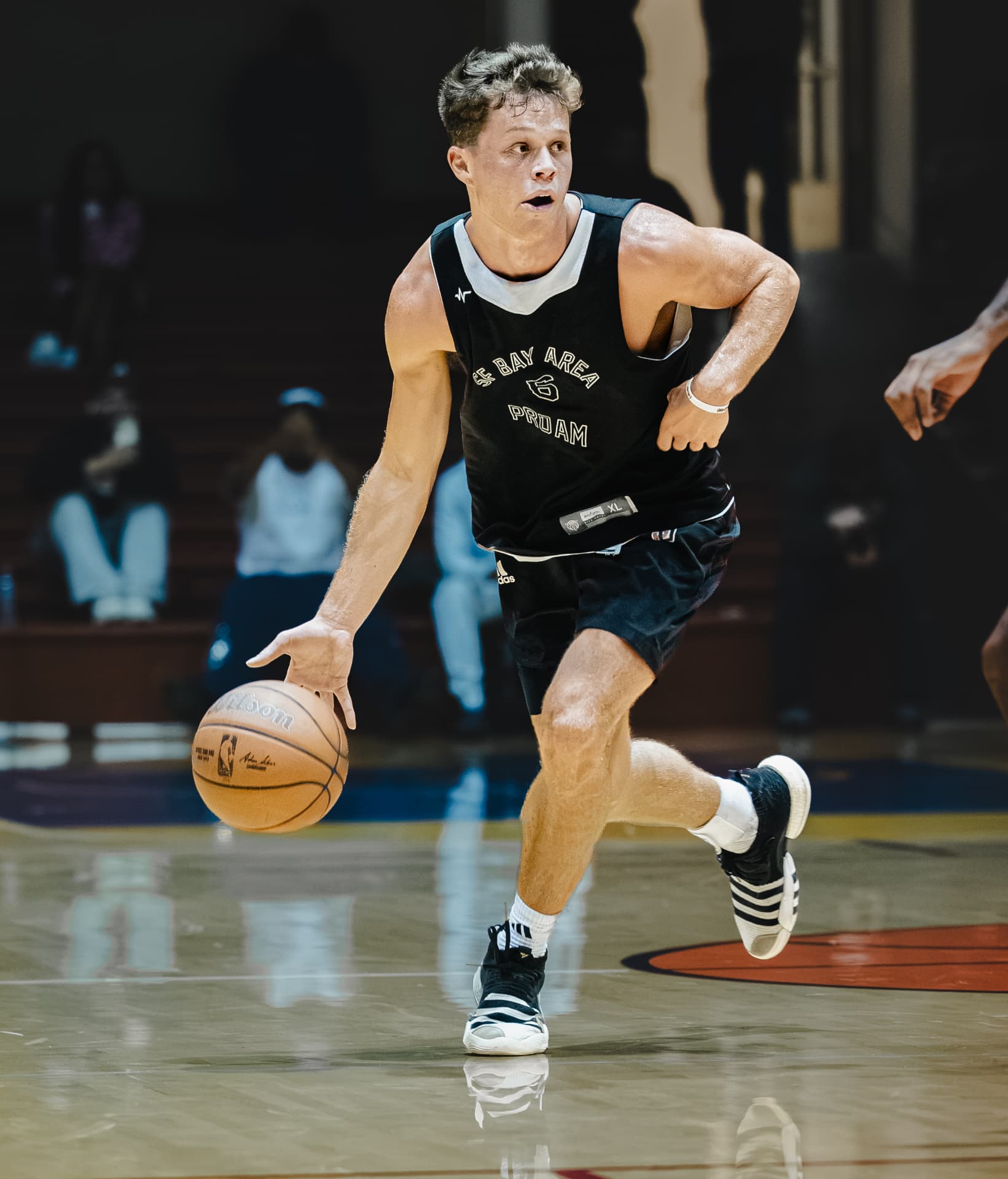 Guard pushing the ball up the floor