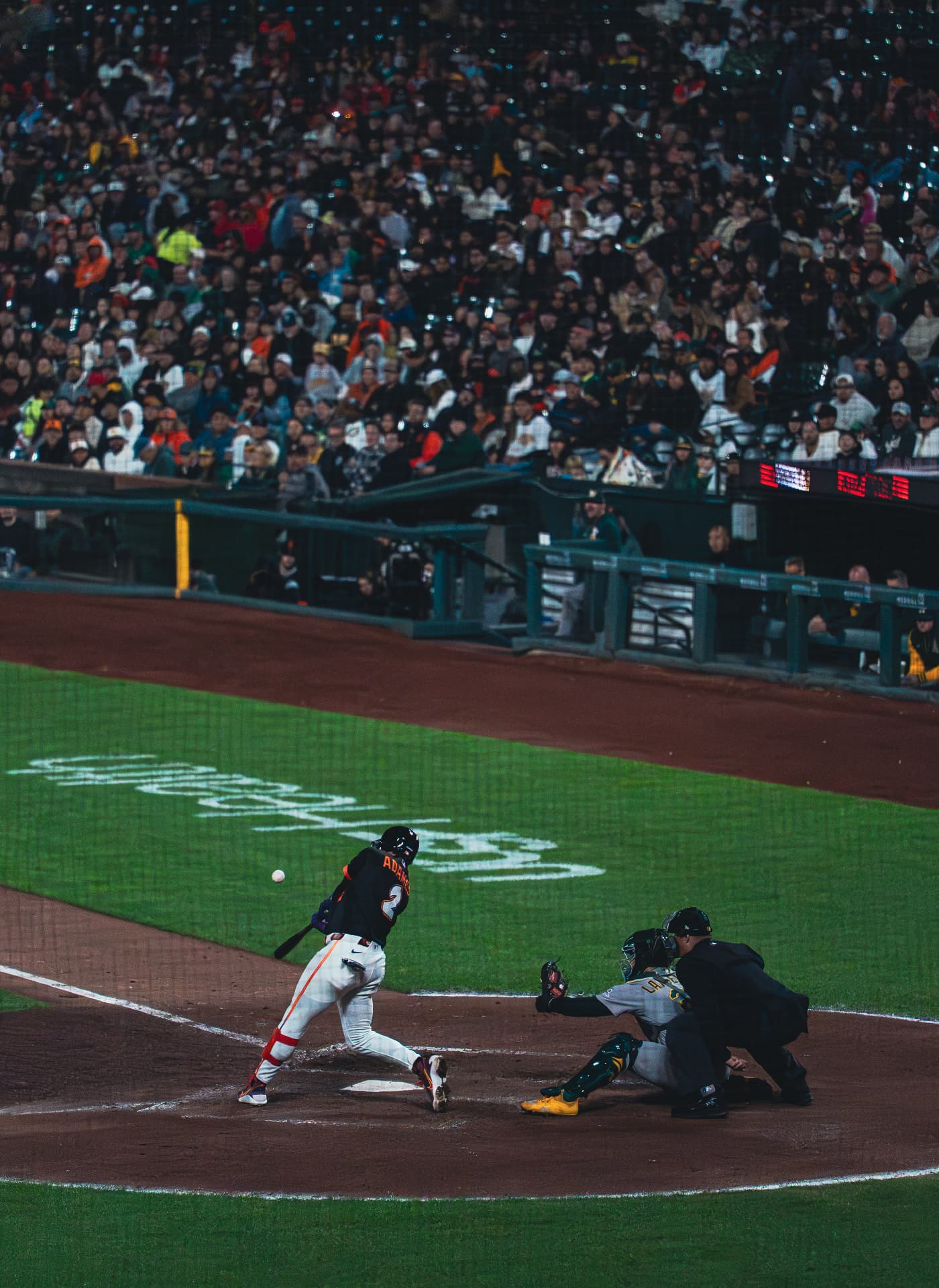 Contact at the plate under the lights